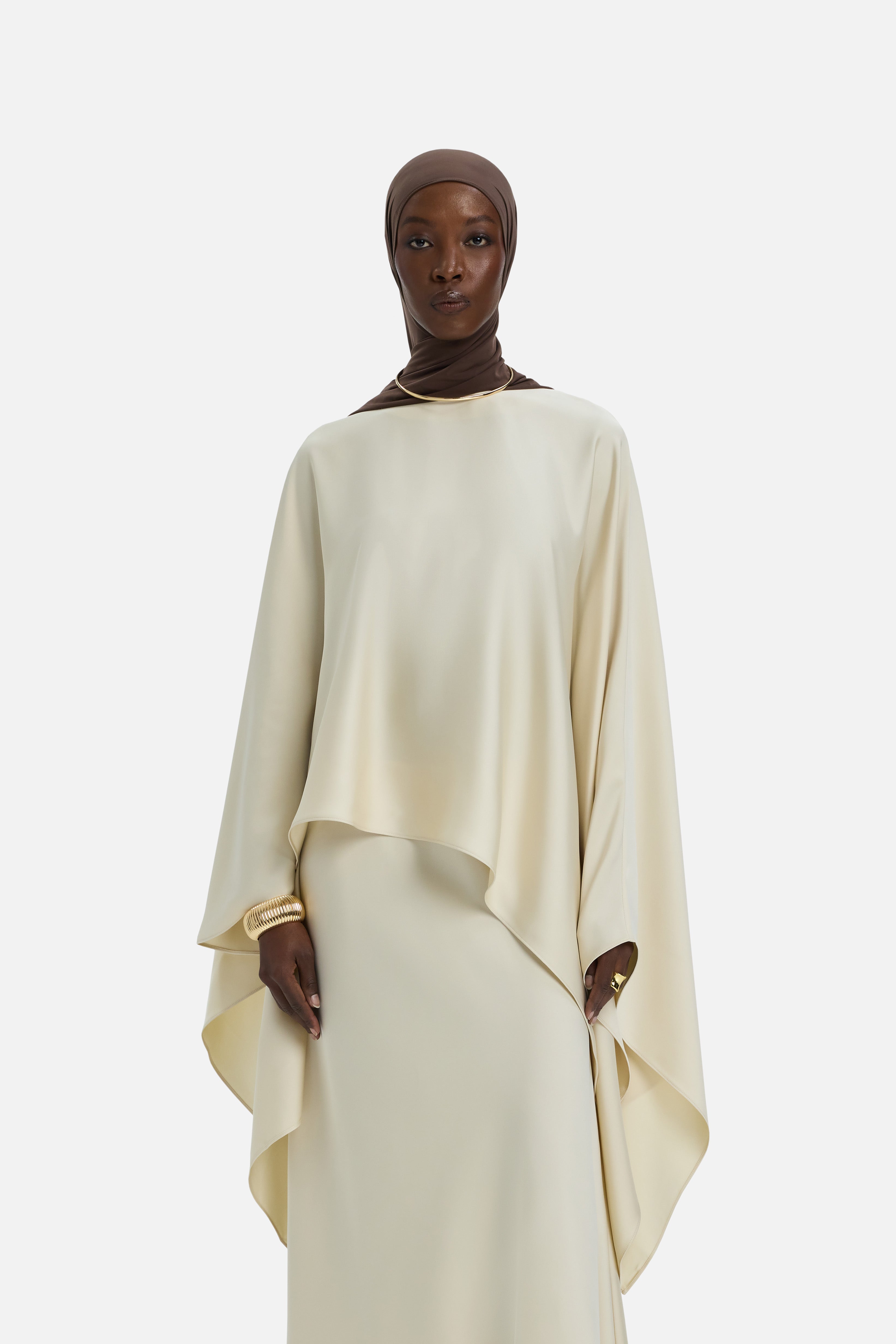 Cropped front view model wearing off white blouse