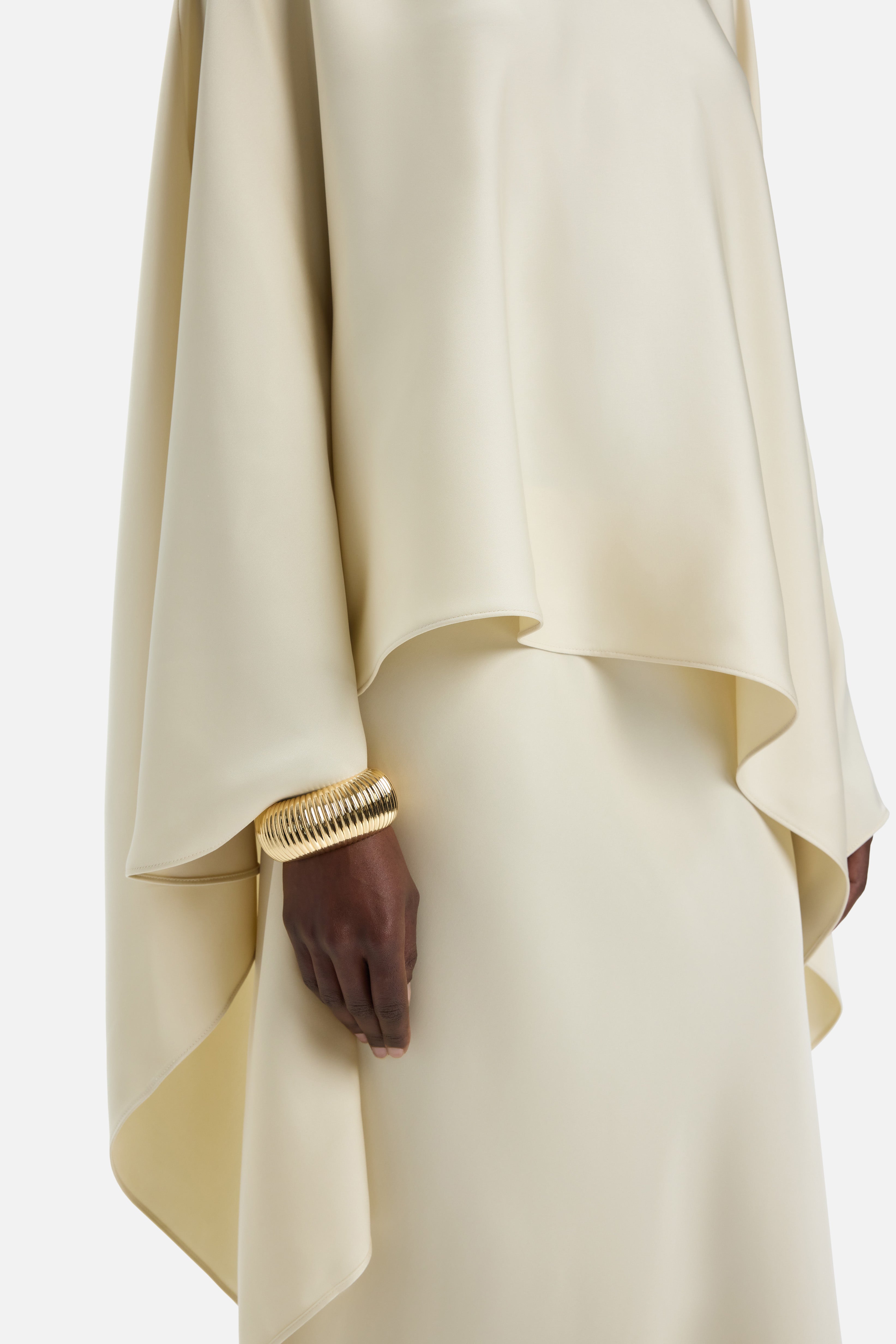 Detail shot side view off white blouse