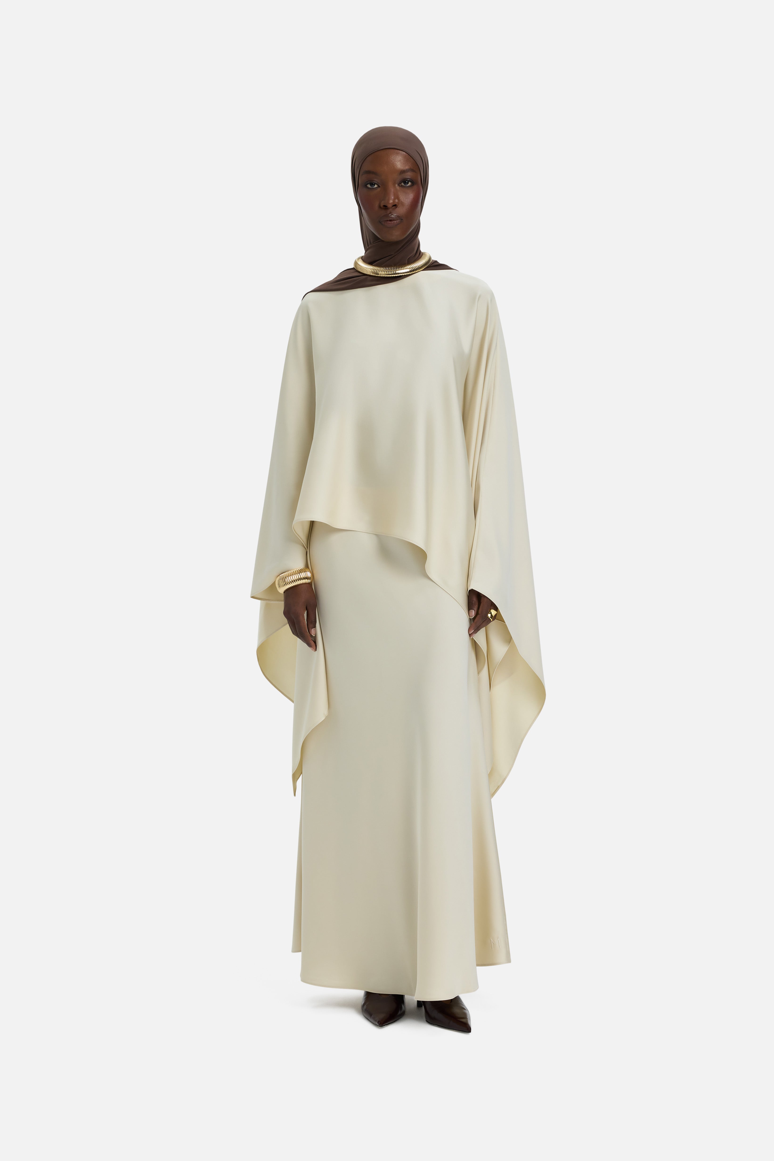 Front view model wearing off white blouse