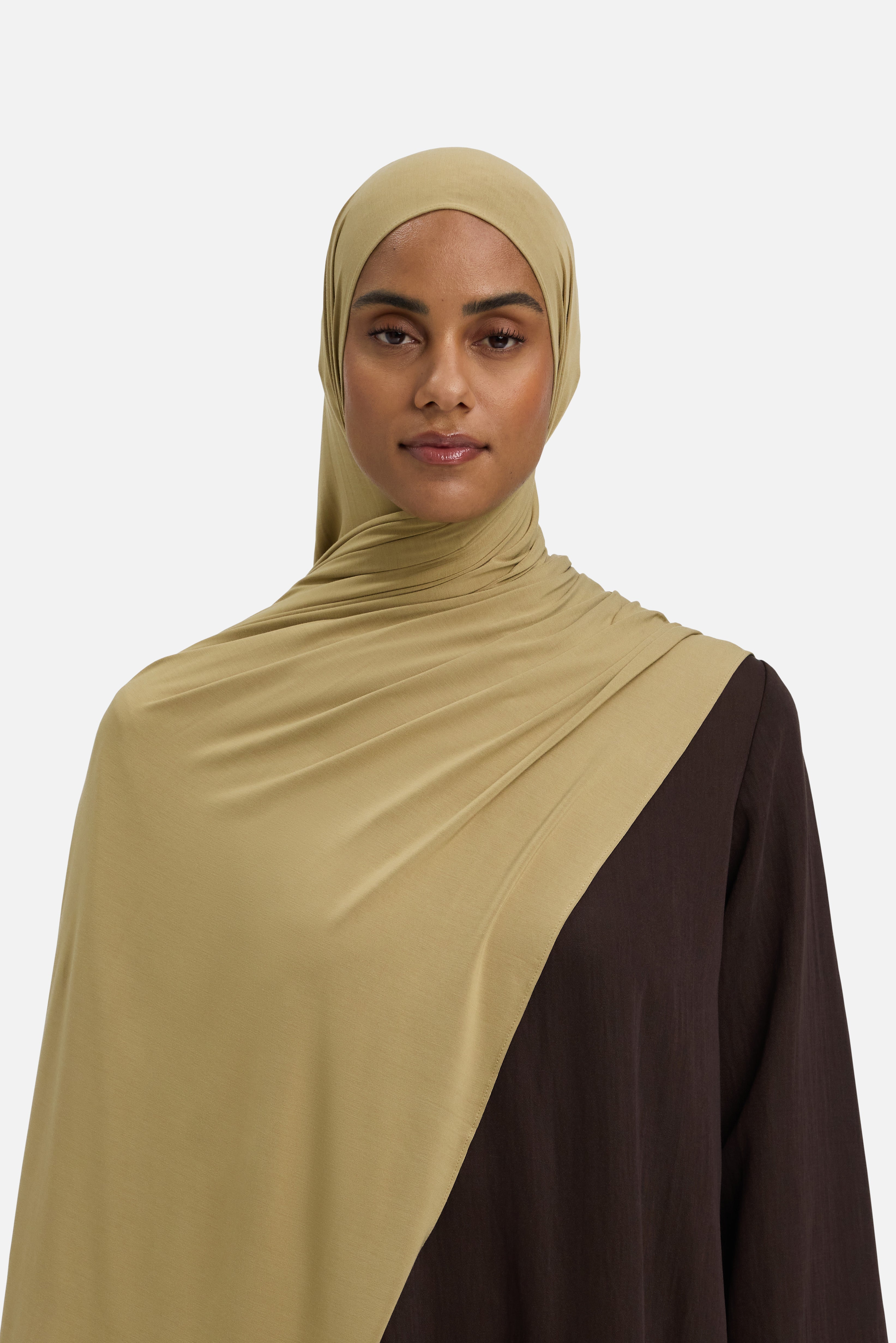 Model wearing light brown MERRACHI headscarf, front view