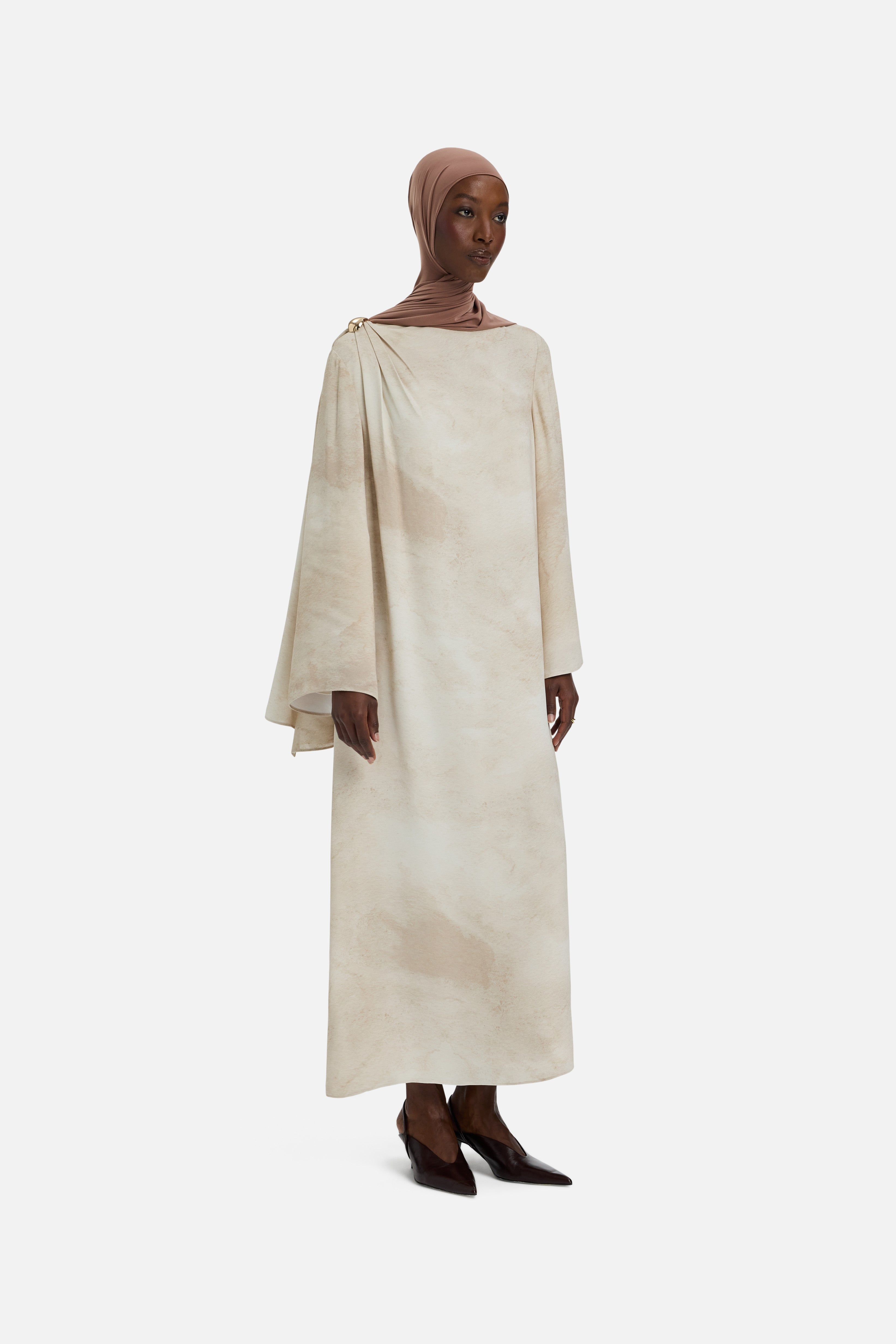 Side view model wearing off white dress marble print