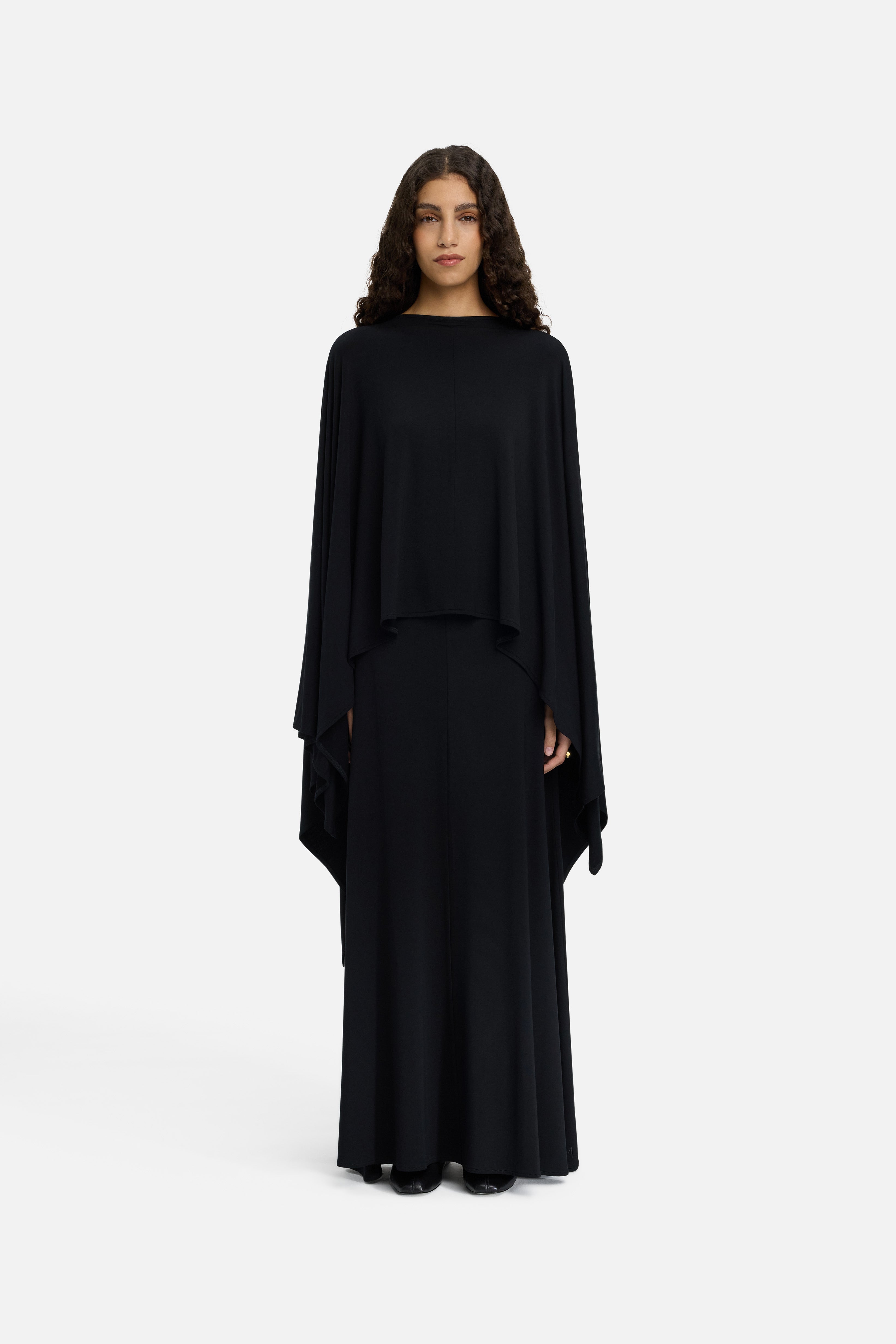 Front view model wearing black maxi skirt