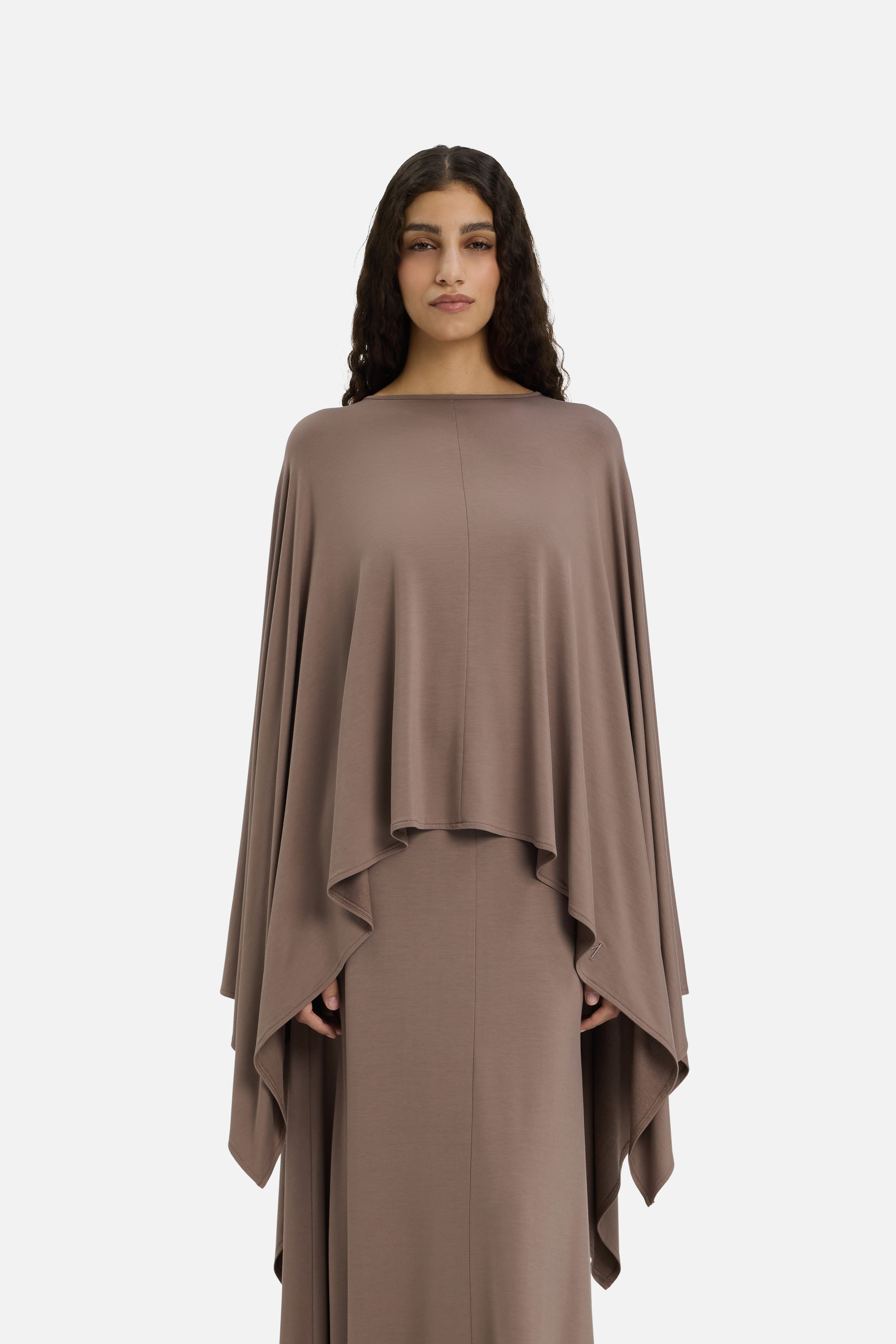 Model wearing taupe MERRACHI cape, cropped front view
