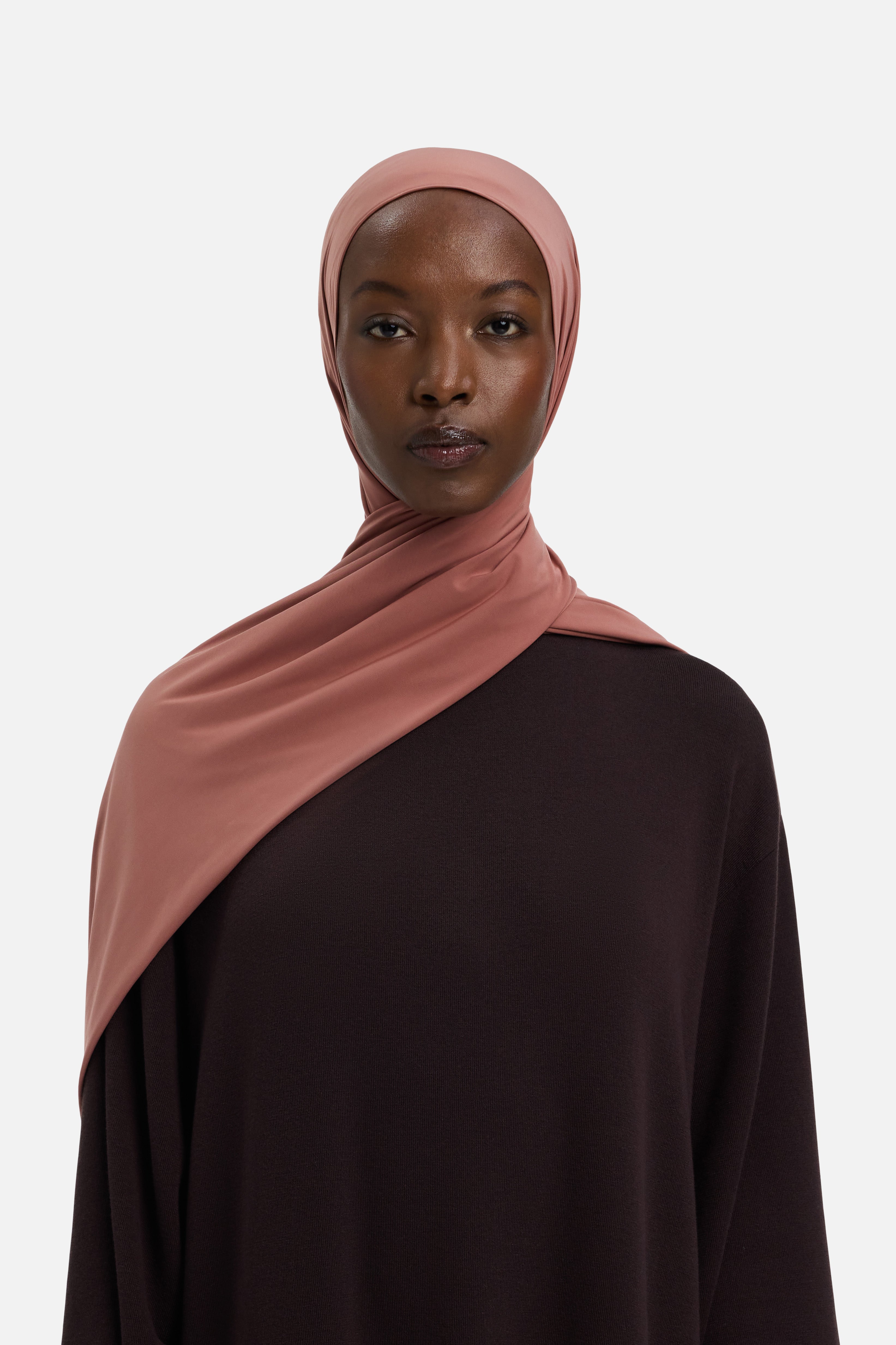 Model wearing pink MERRACHI headscarf, front view