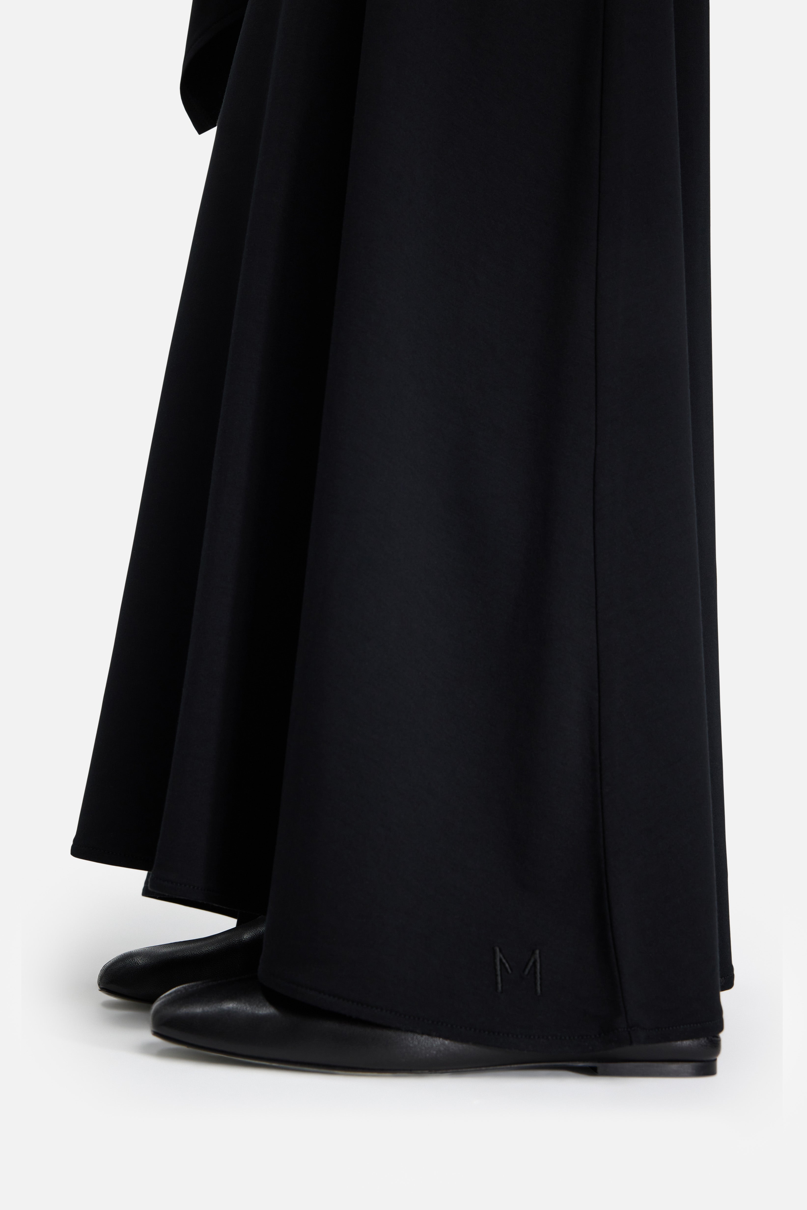 Detail side view black maxi skirt