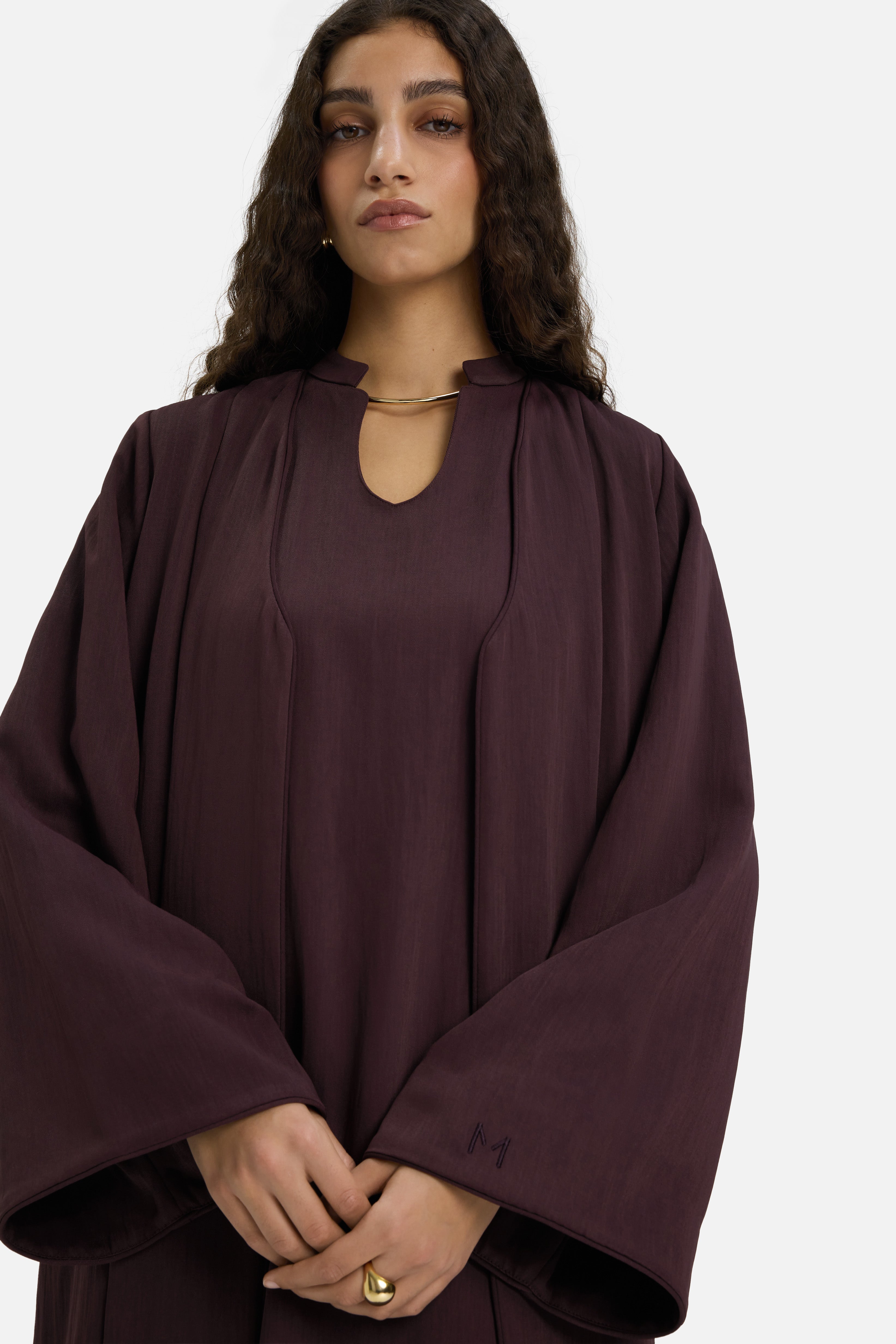 Cropped view model wearing purple abaya