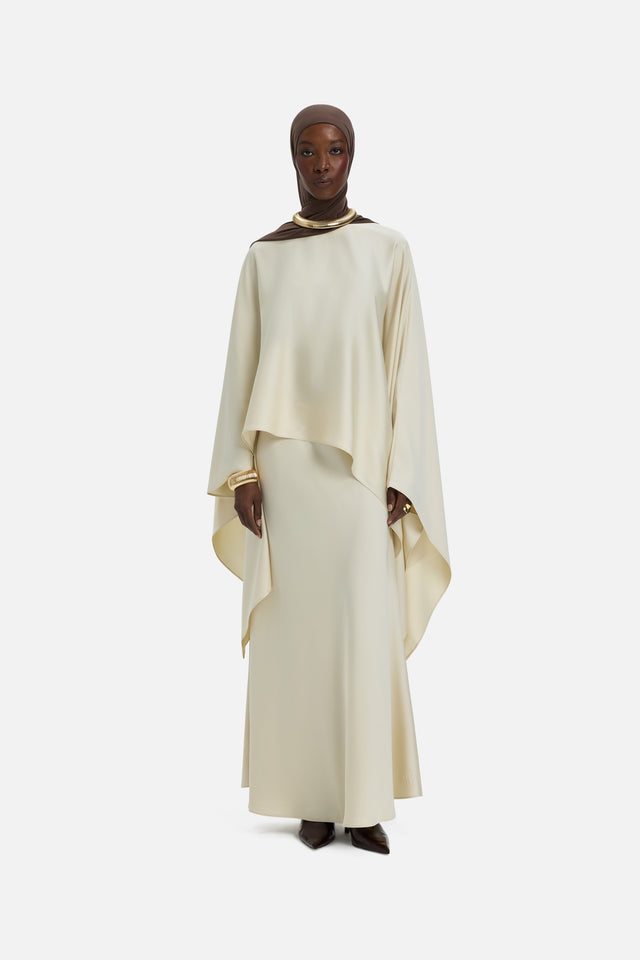 Front view model wearing off white blouse