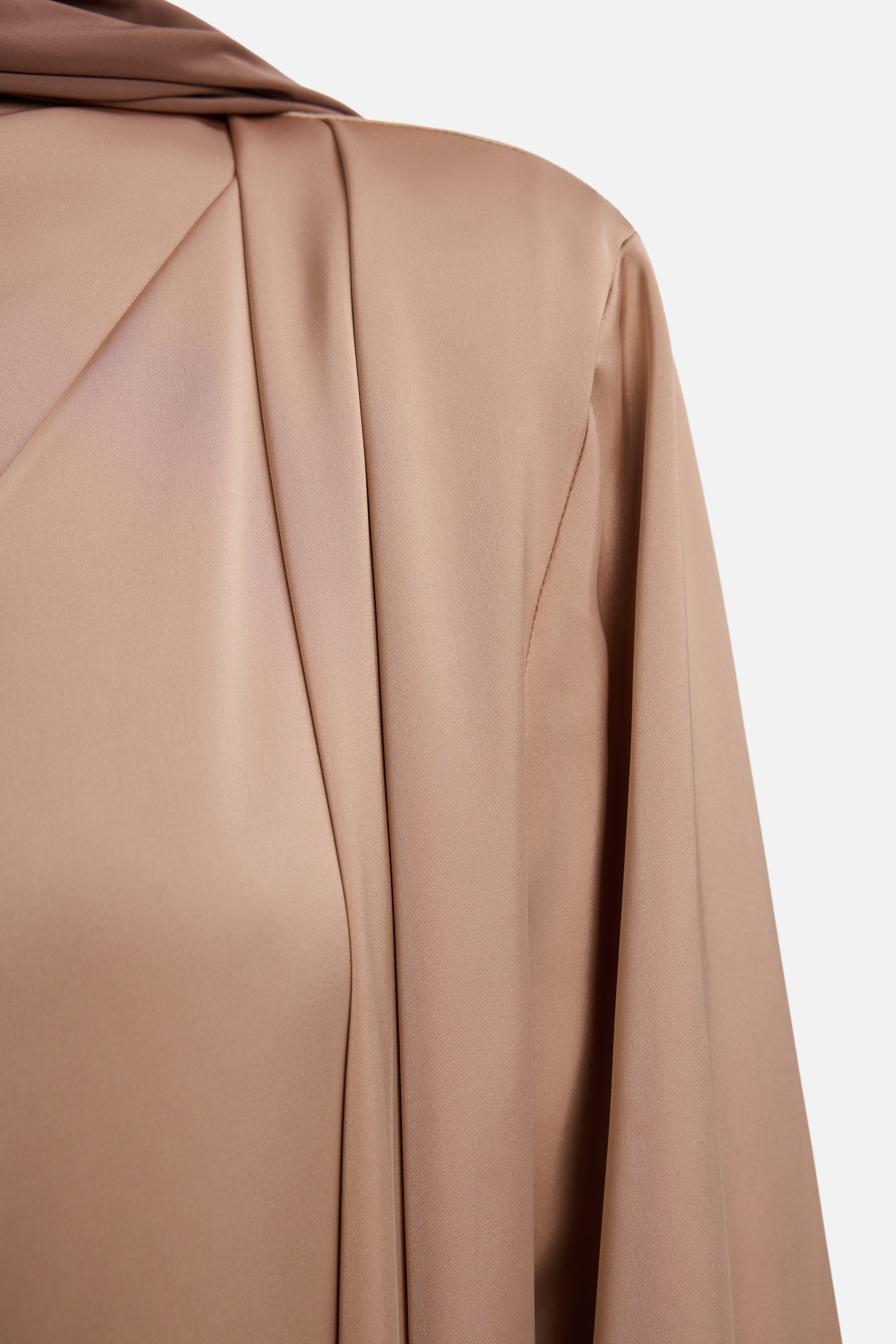 Detail shot shoulder light brown dress