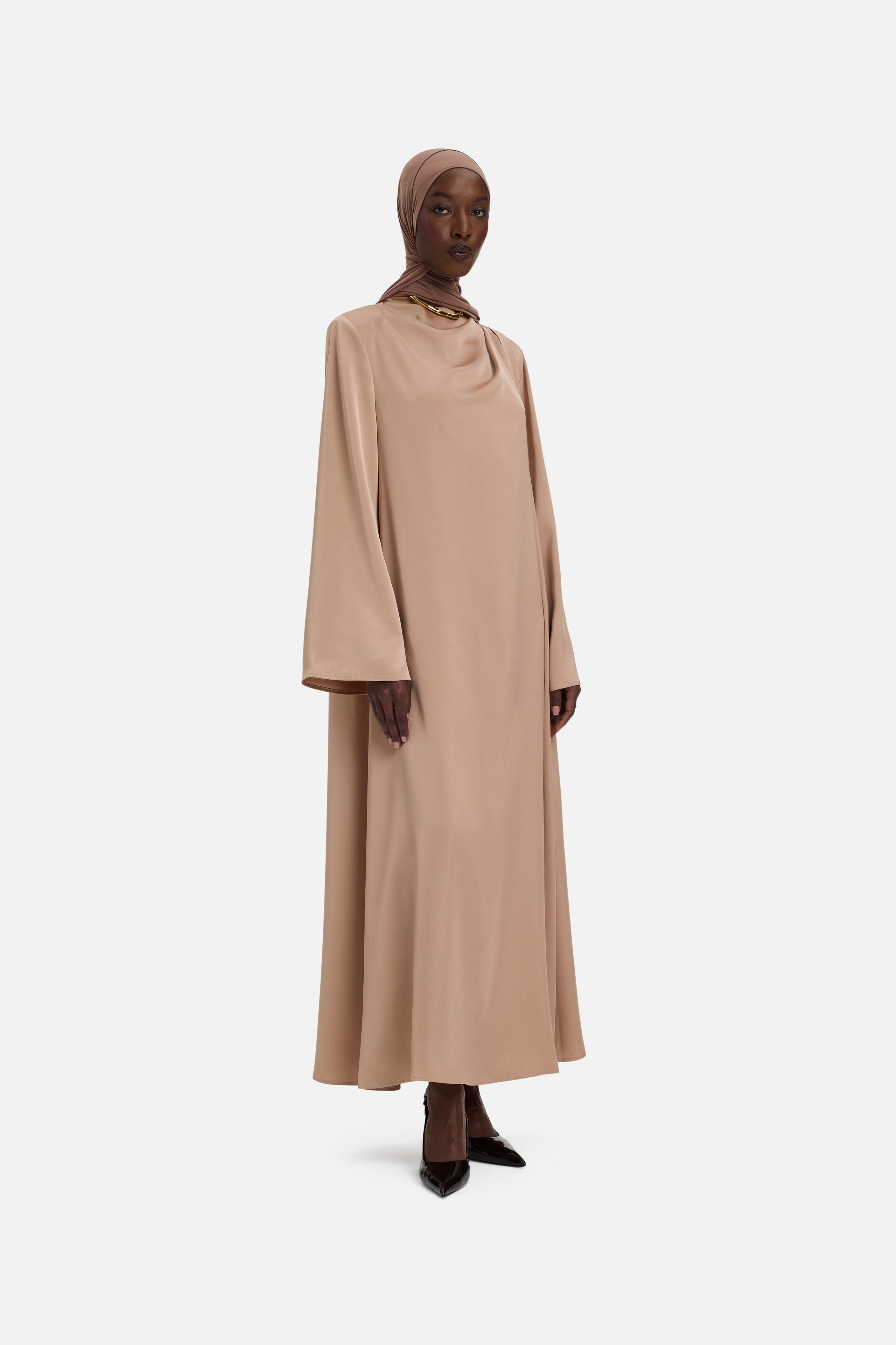 Front view model wearing light brown dress