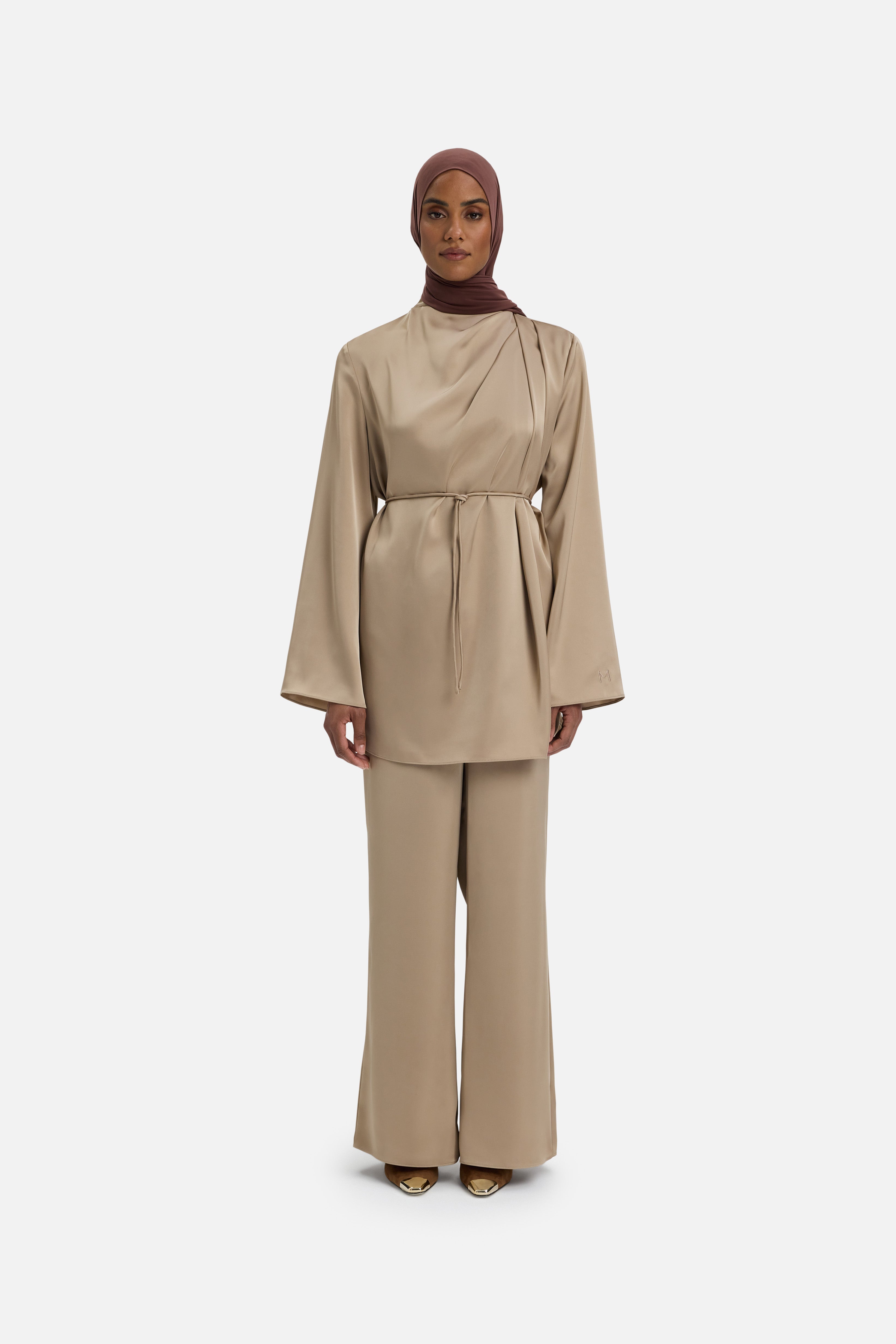 Front view model wearing mocha colored blouse