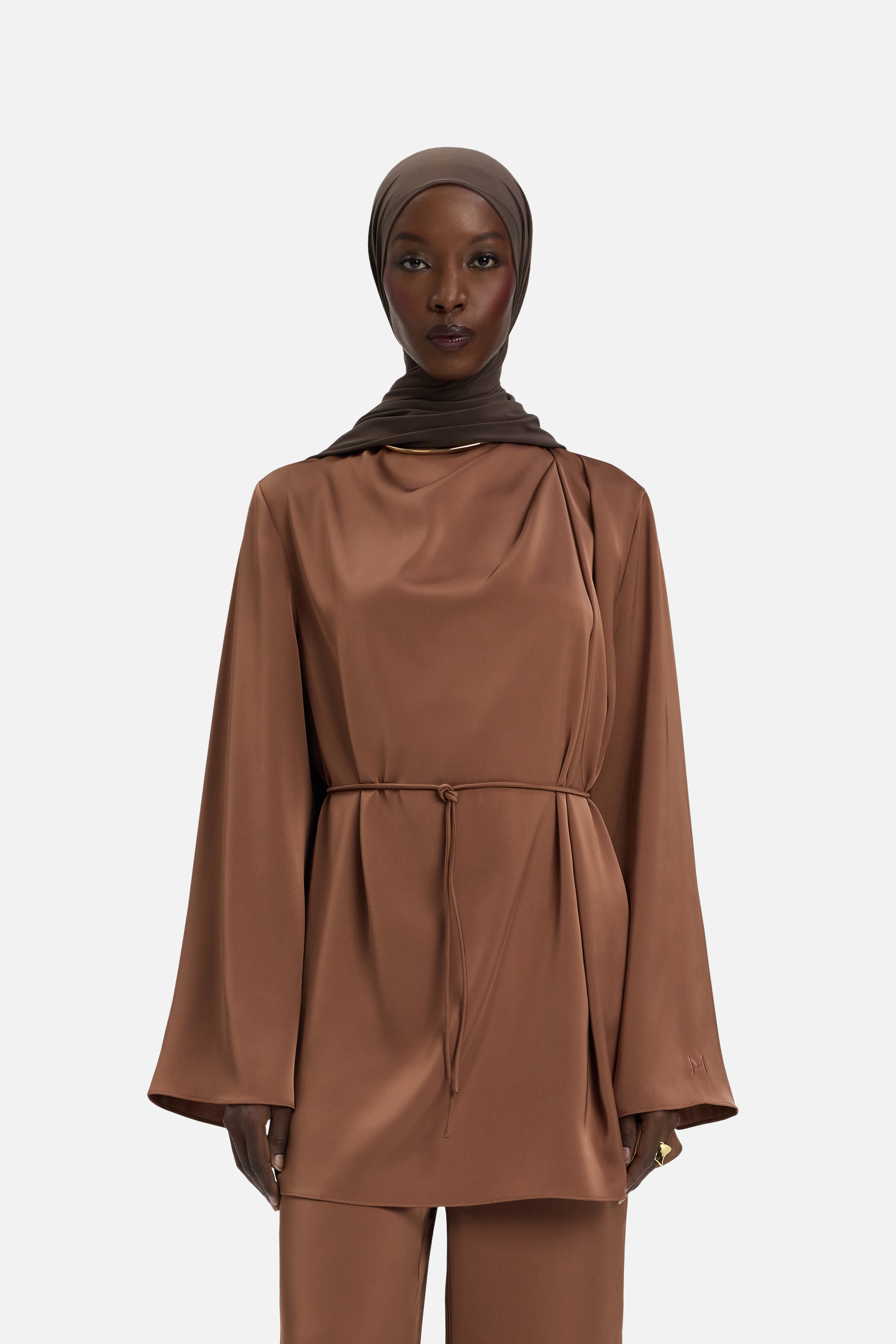 Cropped front view model wearing bordeaux blouse