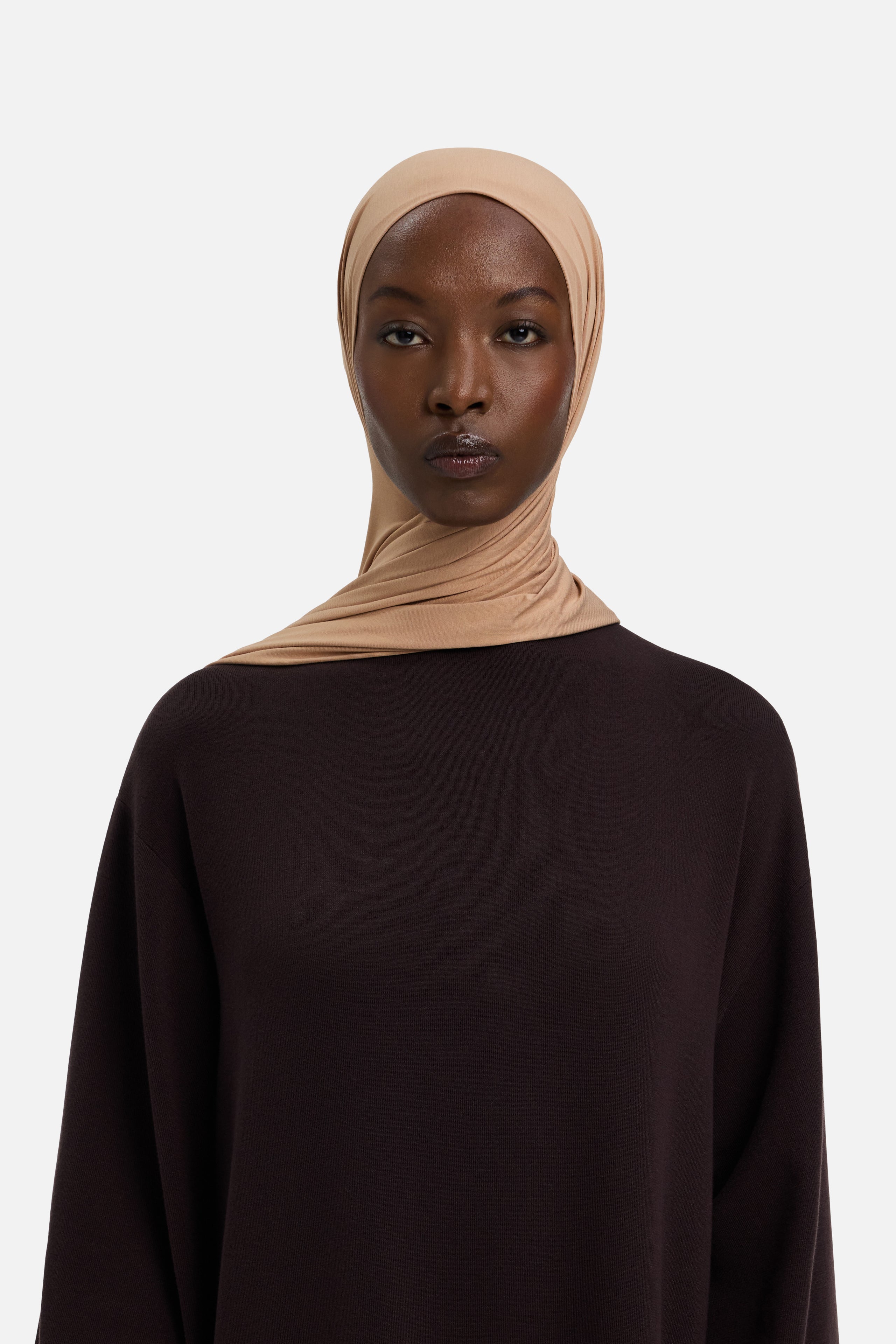 Model wearing beige MERRACHI headscarf, front view