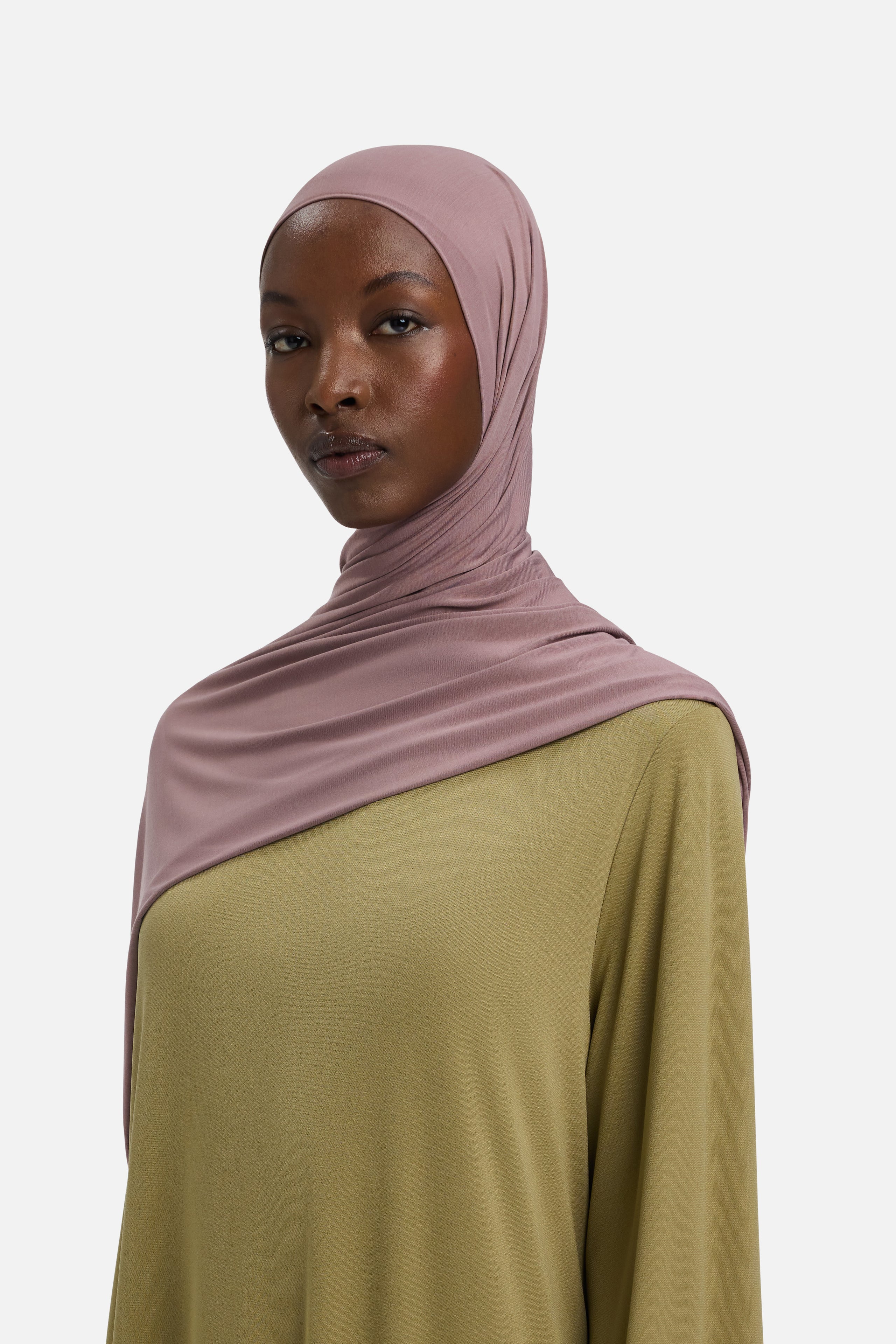 Model wearing purple MERRACHI headscarf, front view