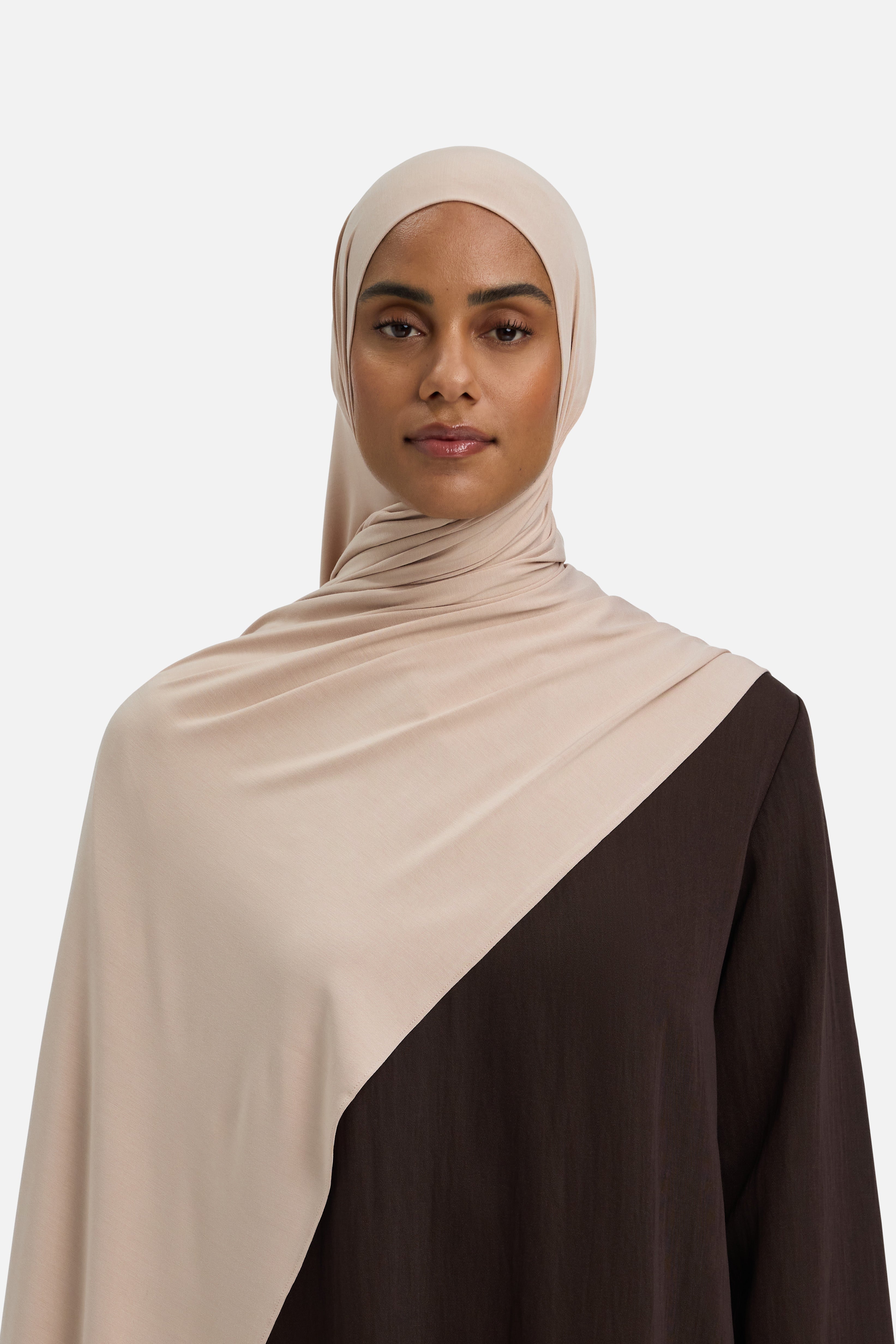 Model wearing beige MERRACHI headscarf, front view