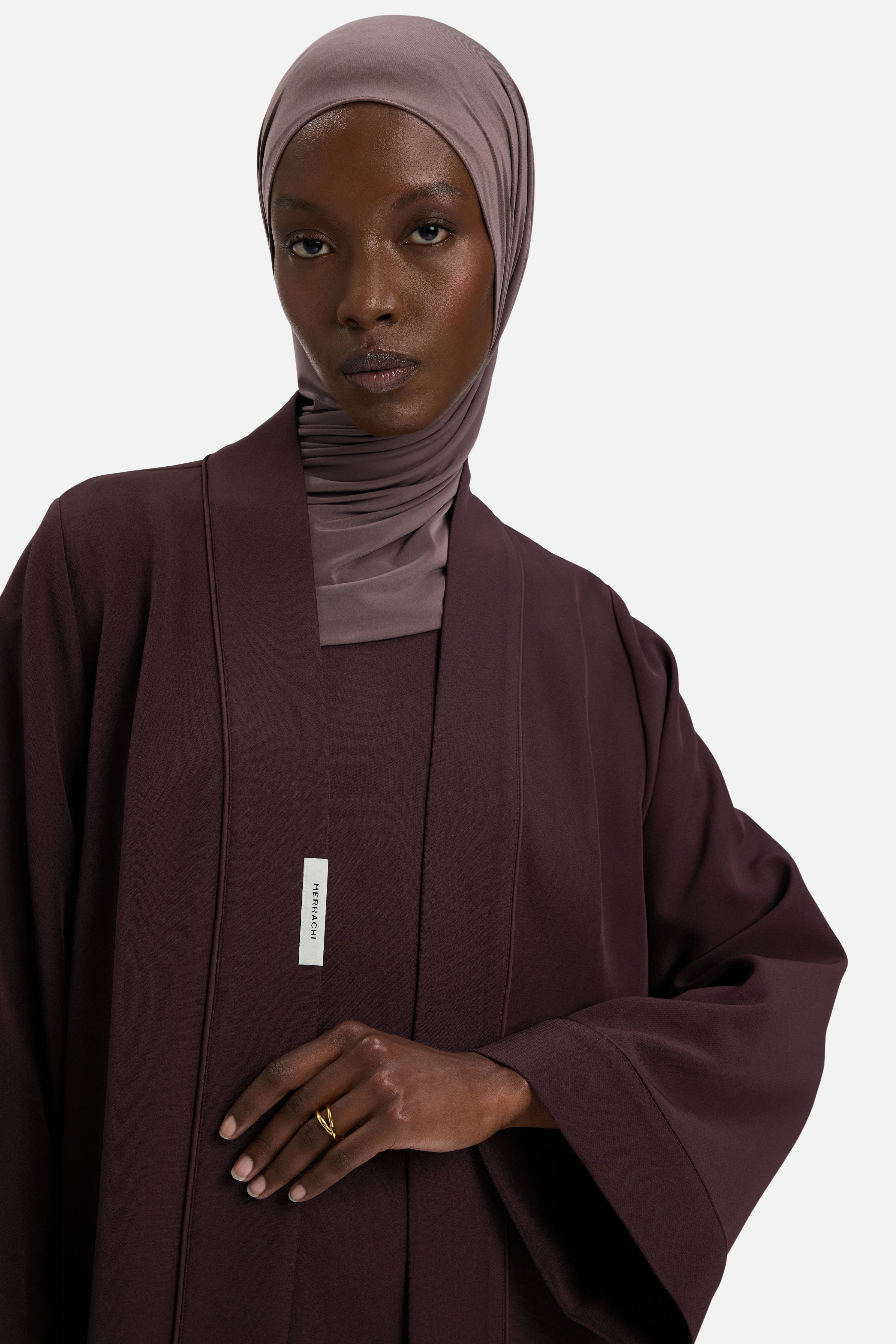 Close up view wearing purple abaya