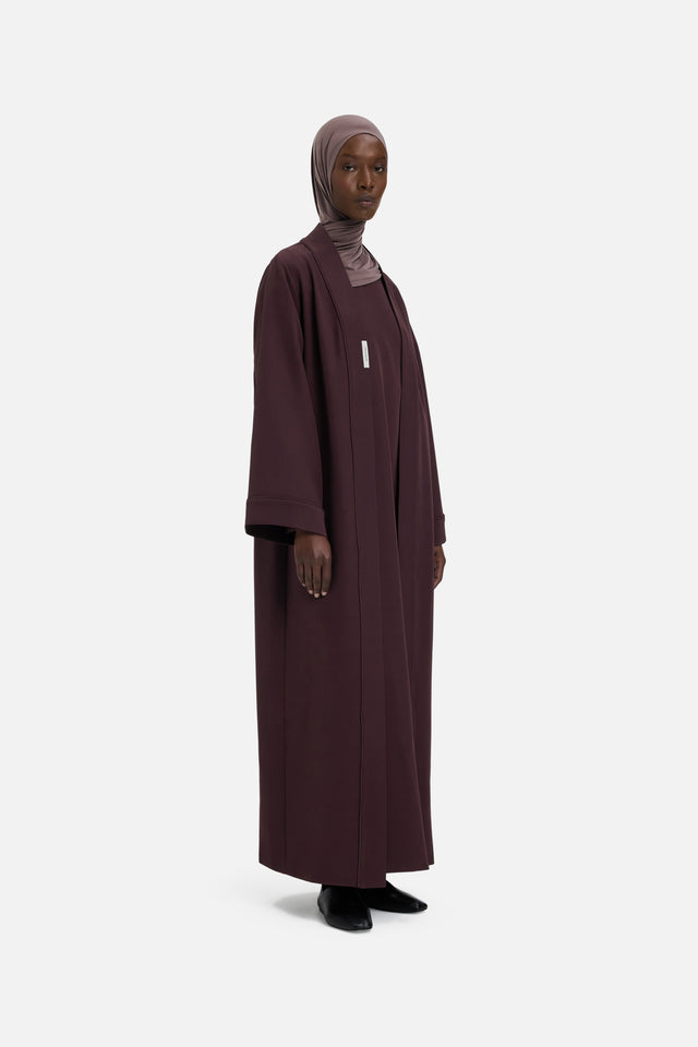 Front view model wearing purple abaya