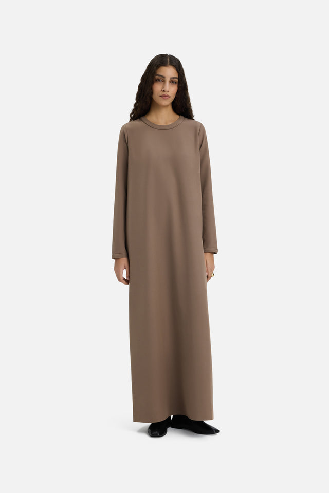 Front view model wearing long taupe dress