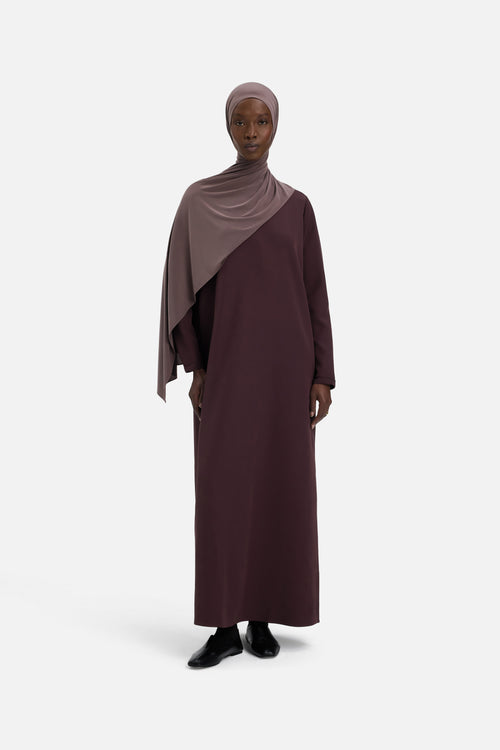 Front view model wearing purple dress and headscarf