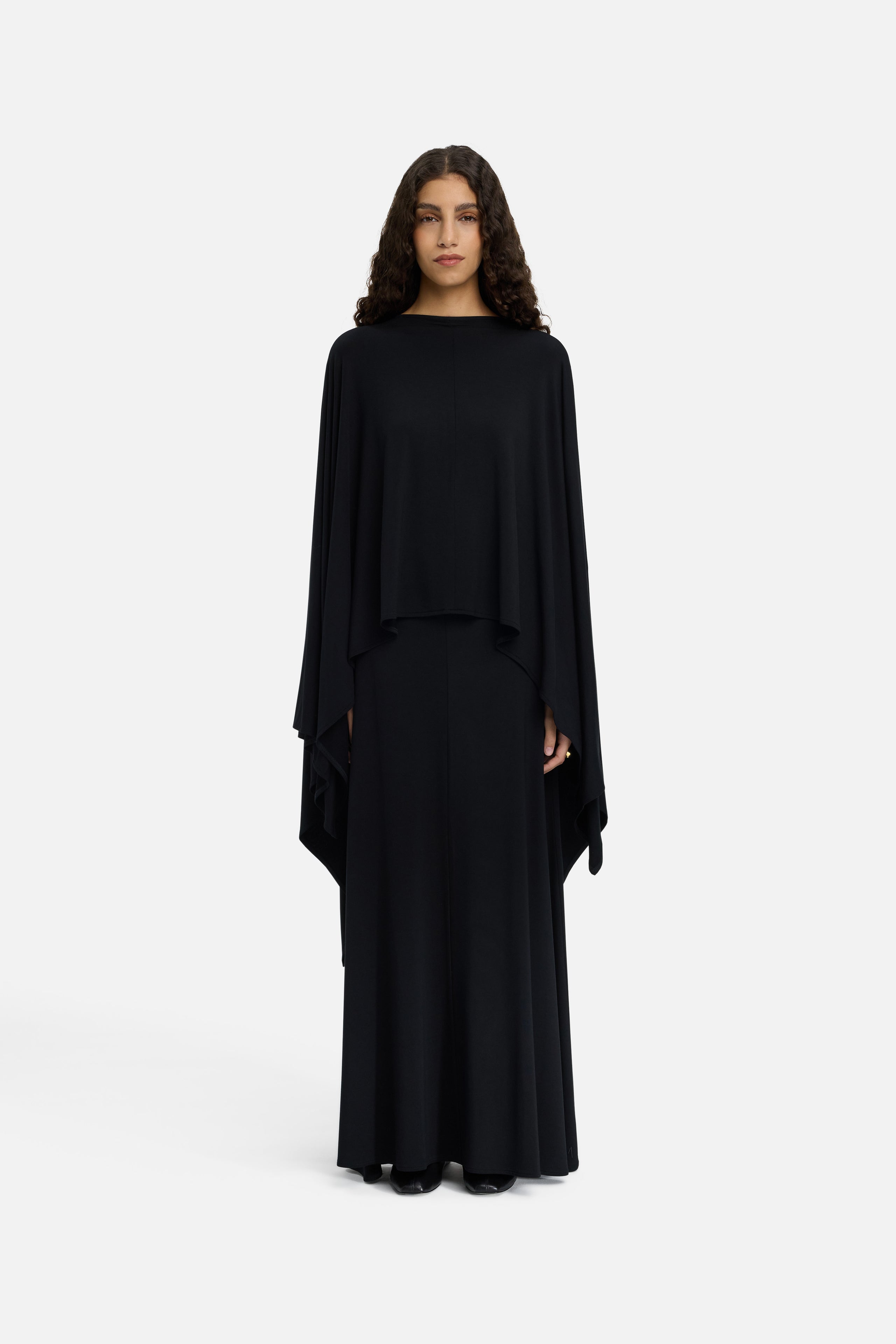 Front view model wearing black maxi skirt