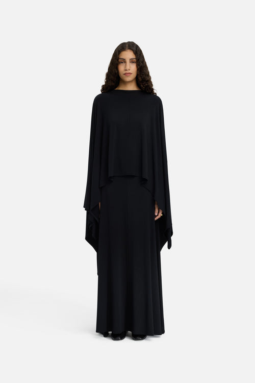 Front view model wearing black maxi skirt