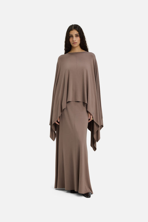 Model wearing taupe MERRACHI cape, front view