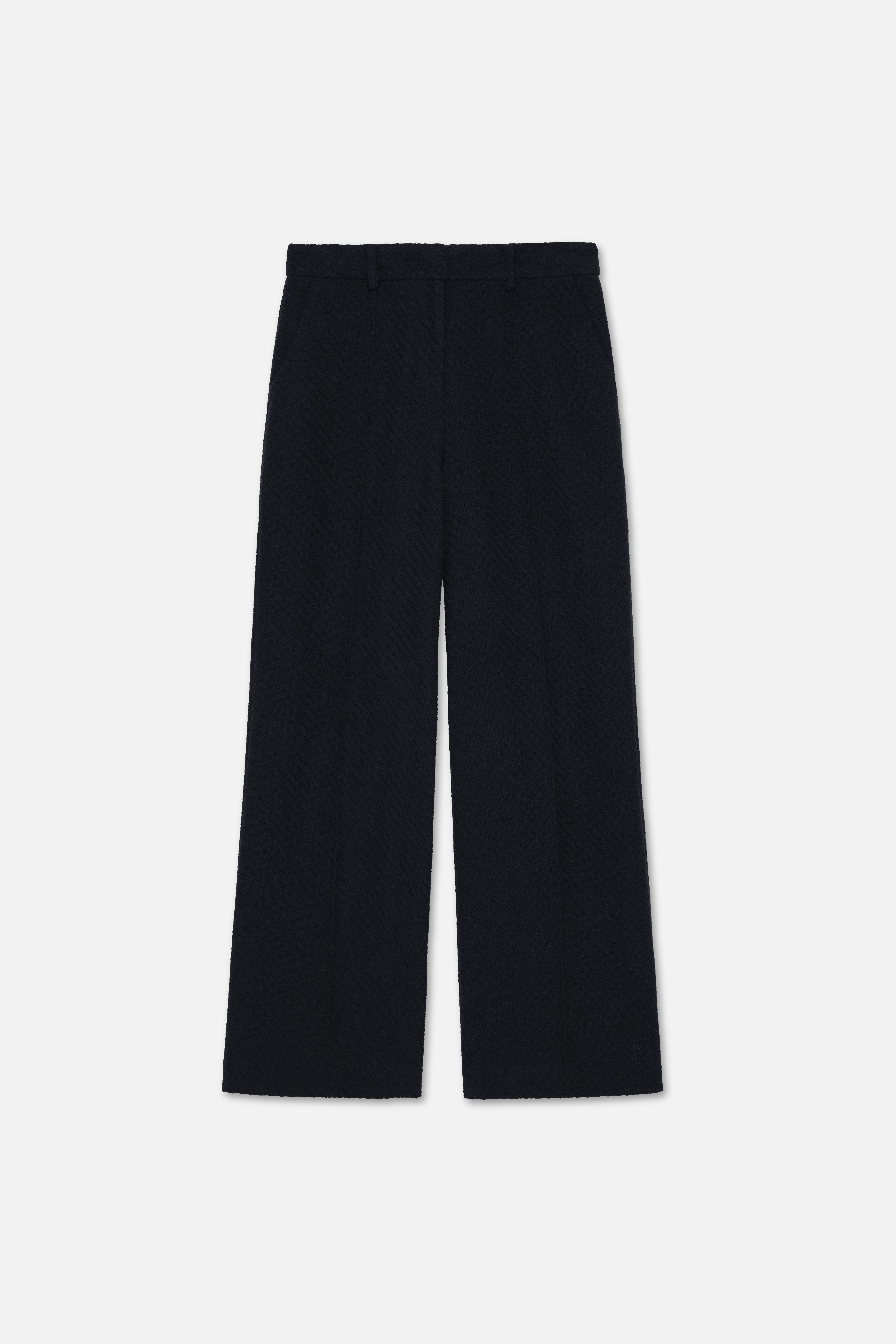 Flat lay front black trousers