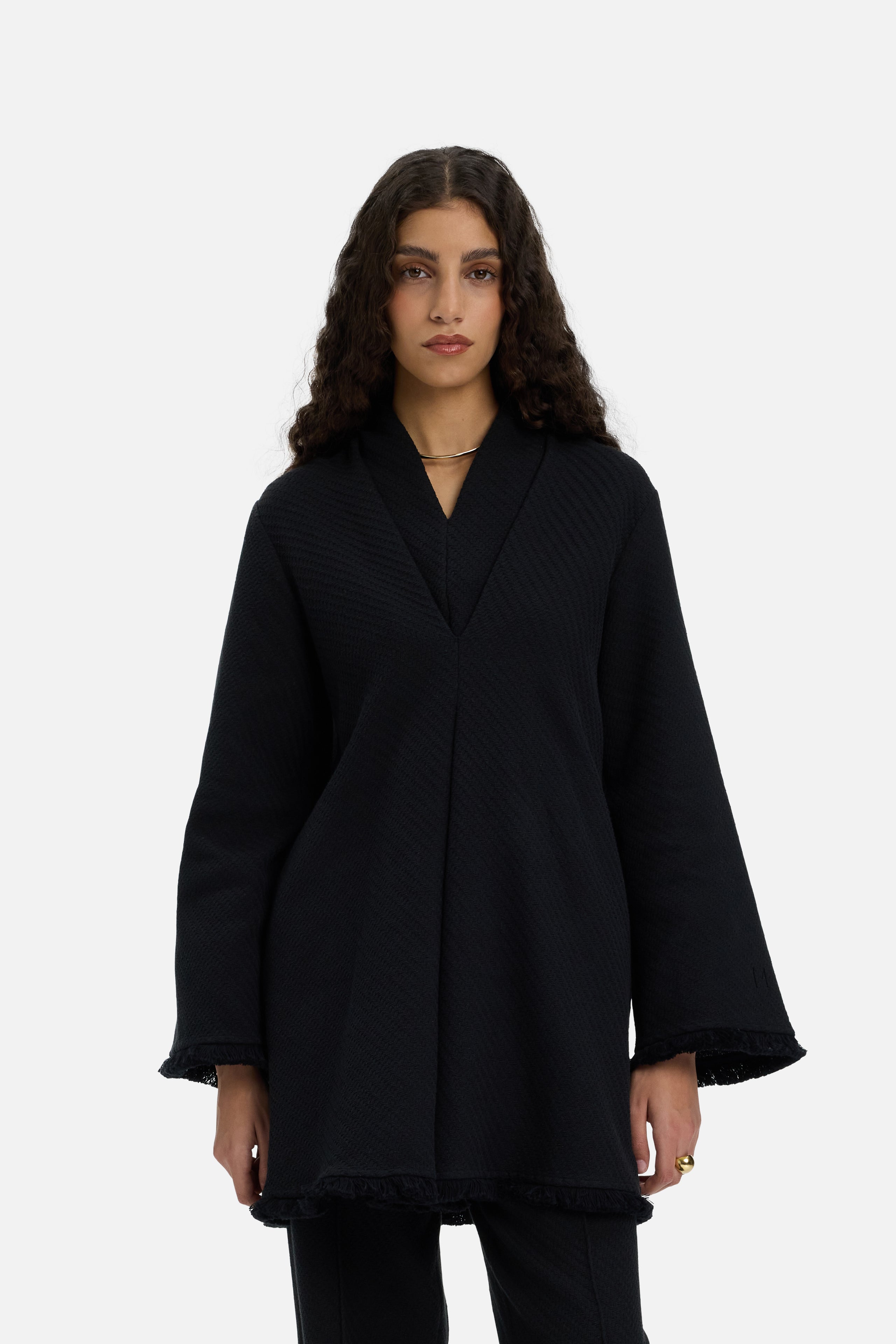 Front view model wearing long black top