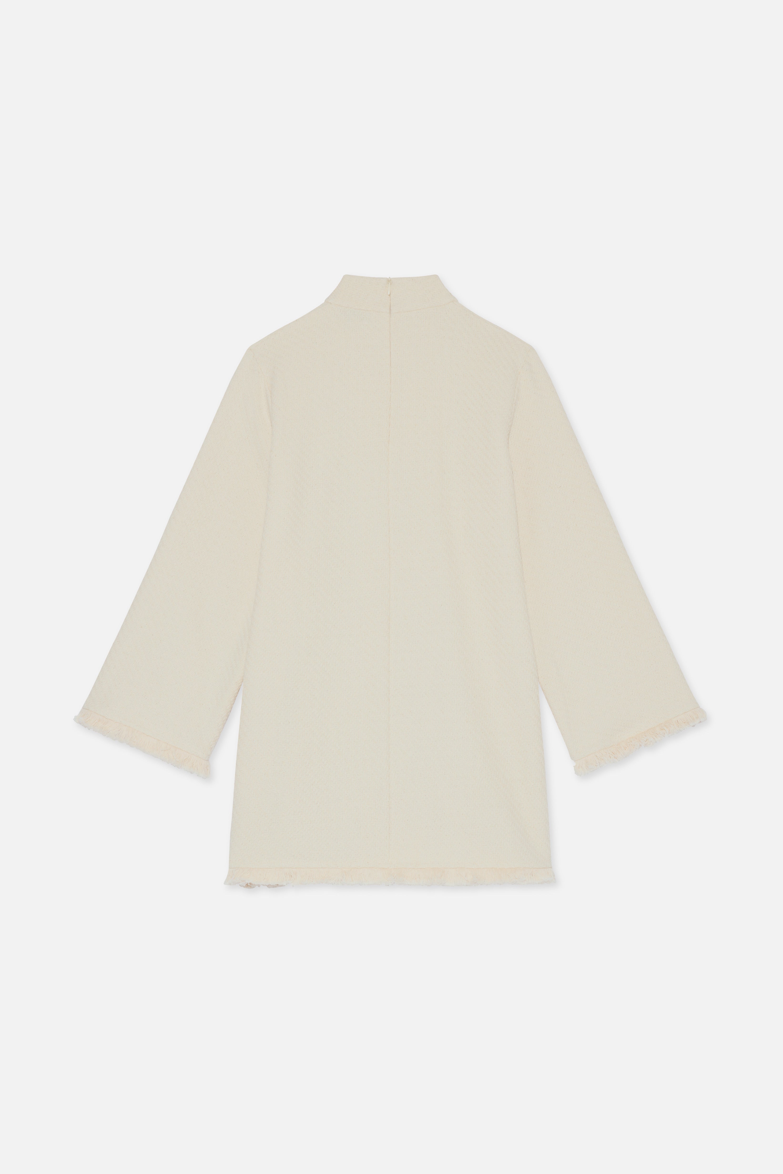 Flat lay back off white top