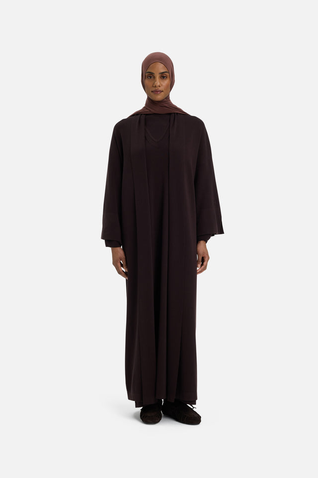Front view model wearing brown abaya and headscarf