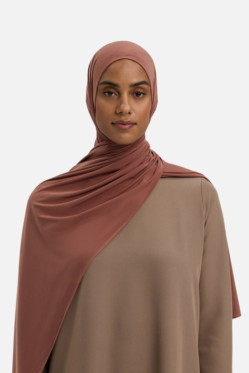 Model wearing brown MERRACHI headscarf, front view