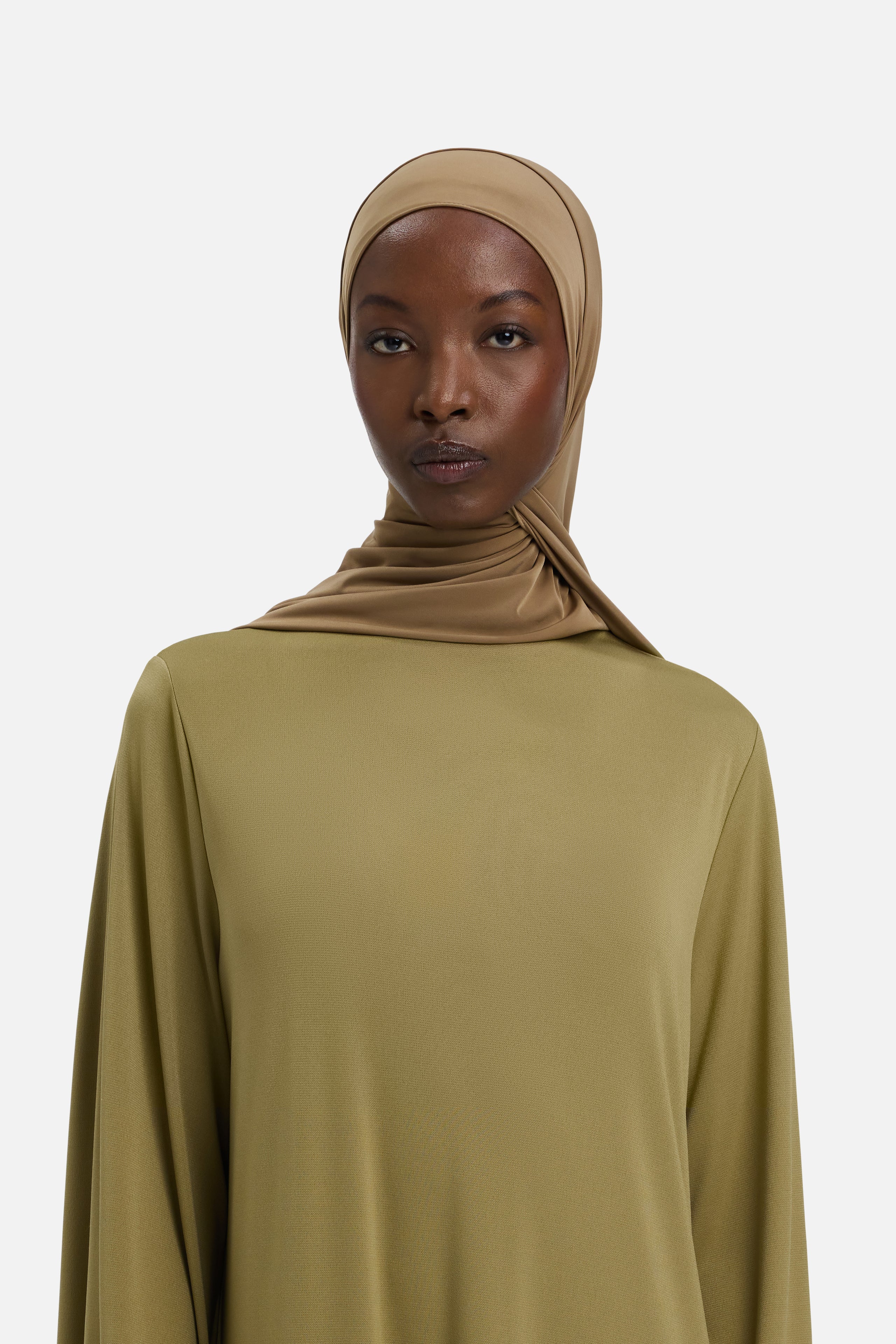 Model wearing brown MERRACHI headscarf, front view