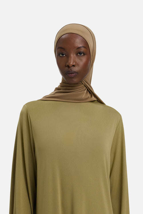 Model wearing brown MERRACHI headscarf, front view