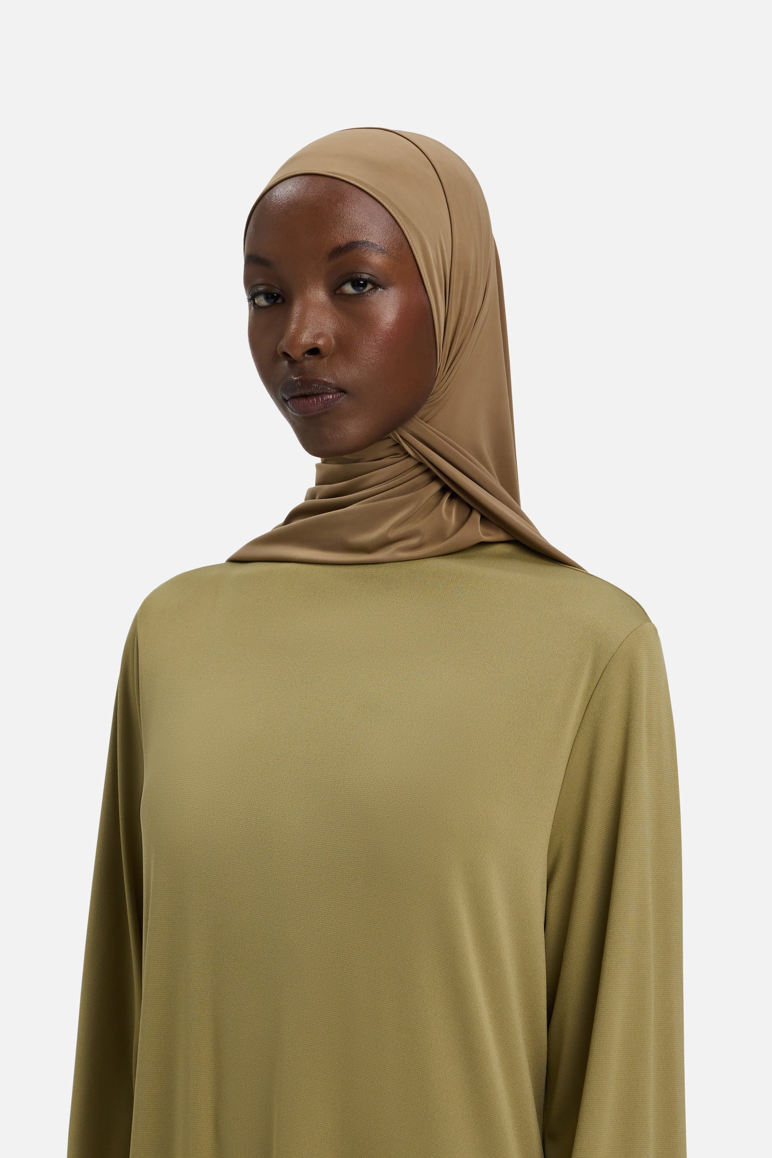 Model wearing brown MERRACHI headscarf, front view