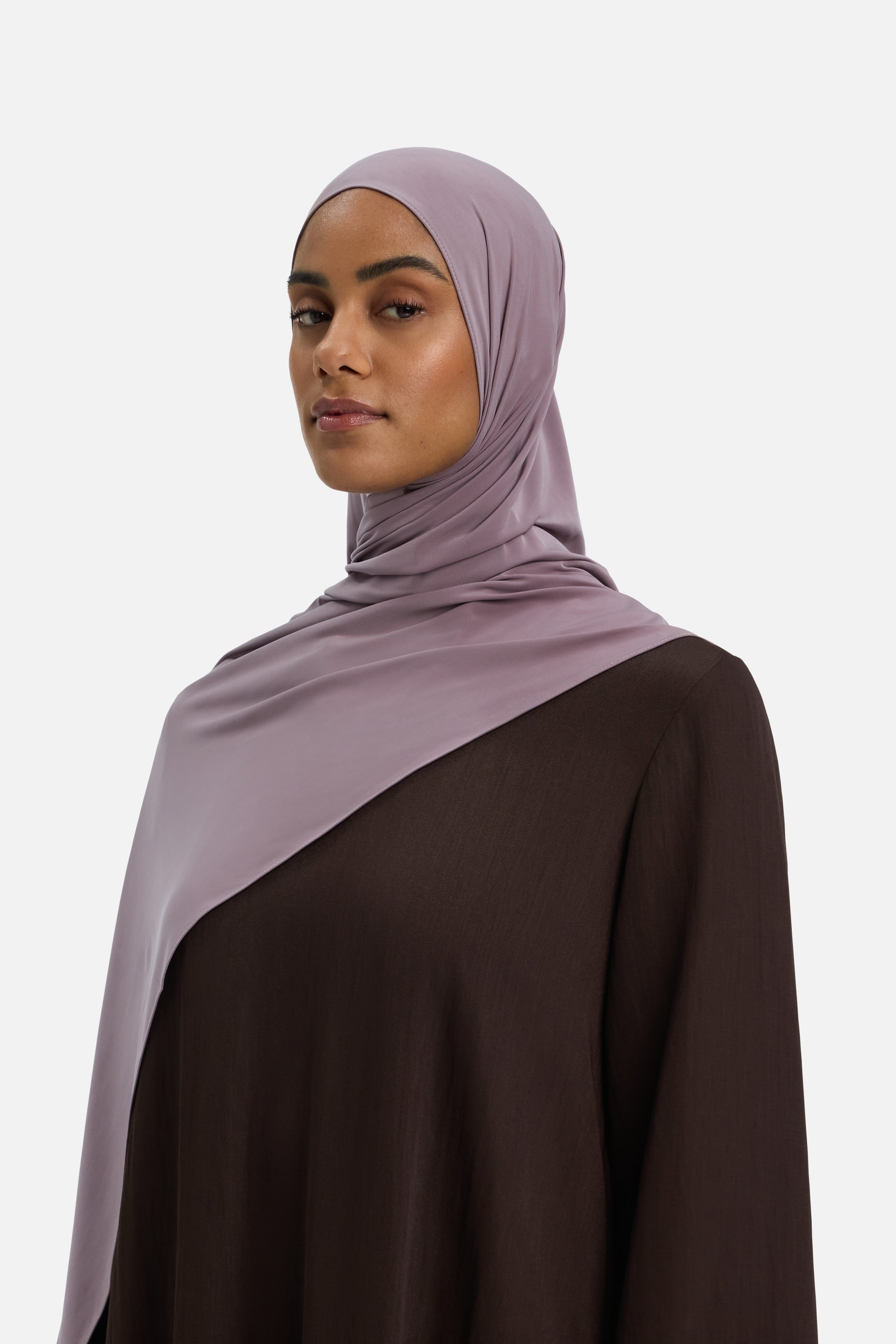 Model wearing purple MERRACHI headscarf, front view