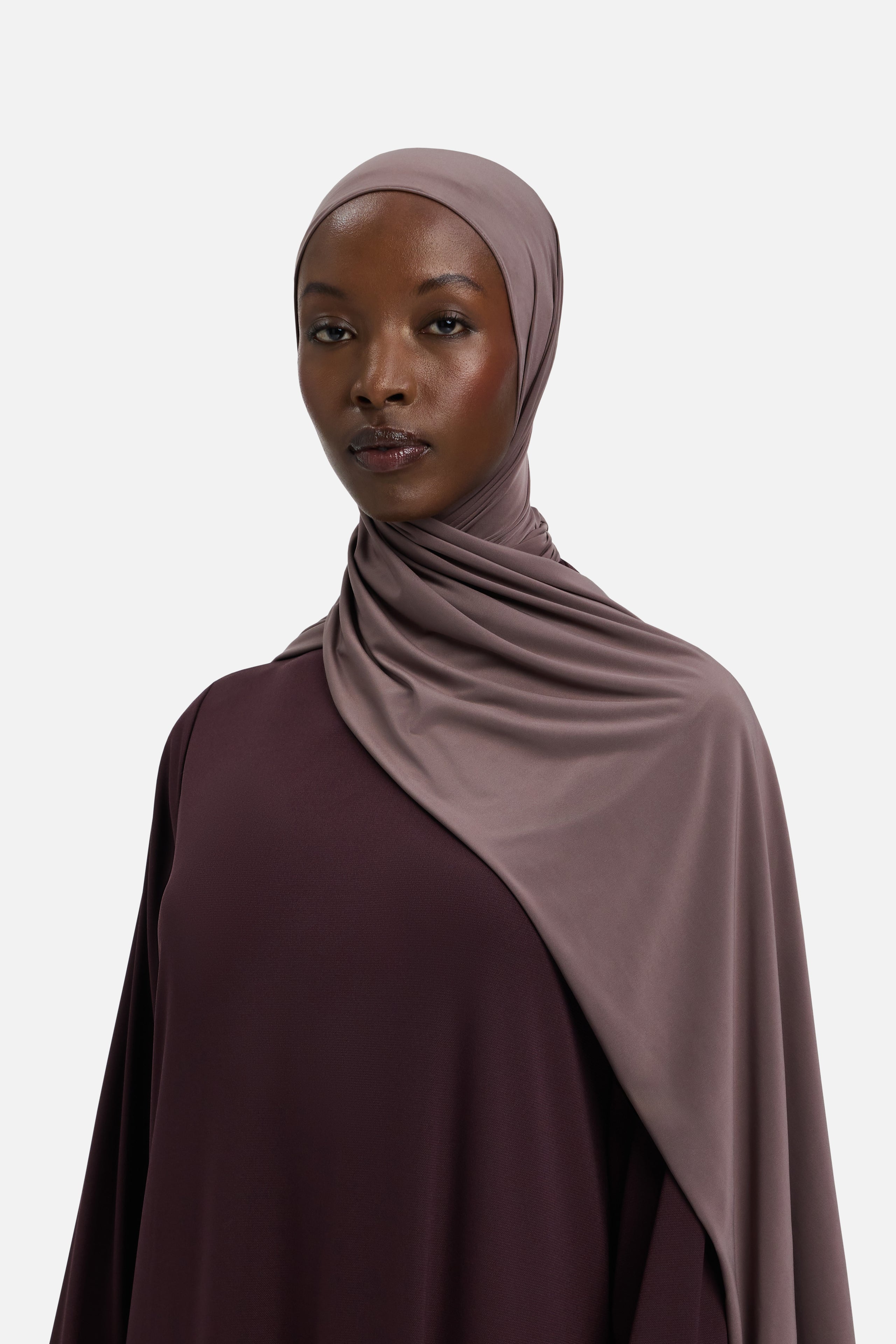 Model wearing purple MERRACHI headscarf, front view