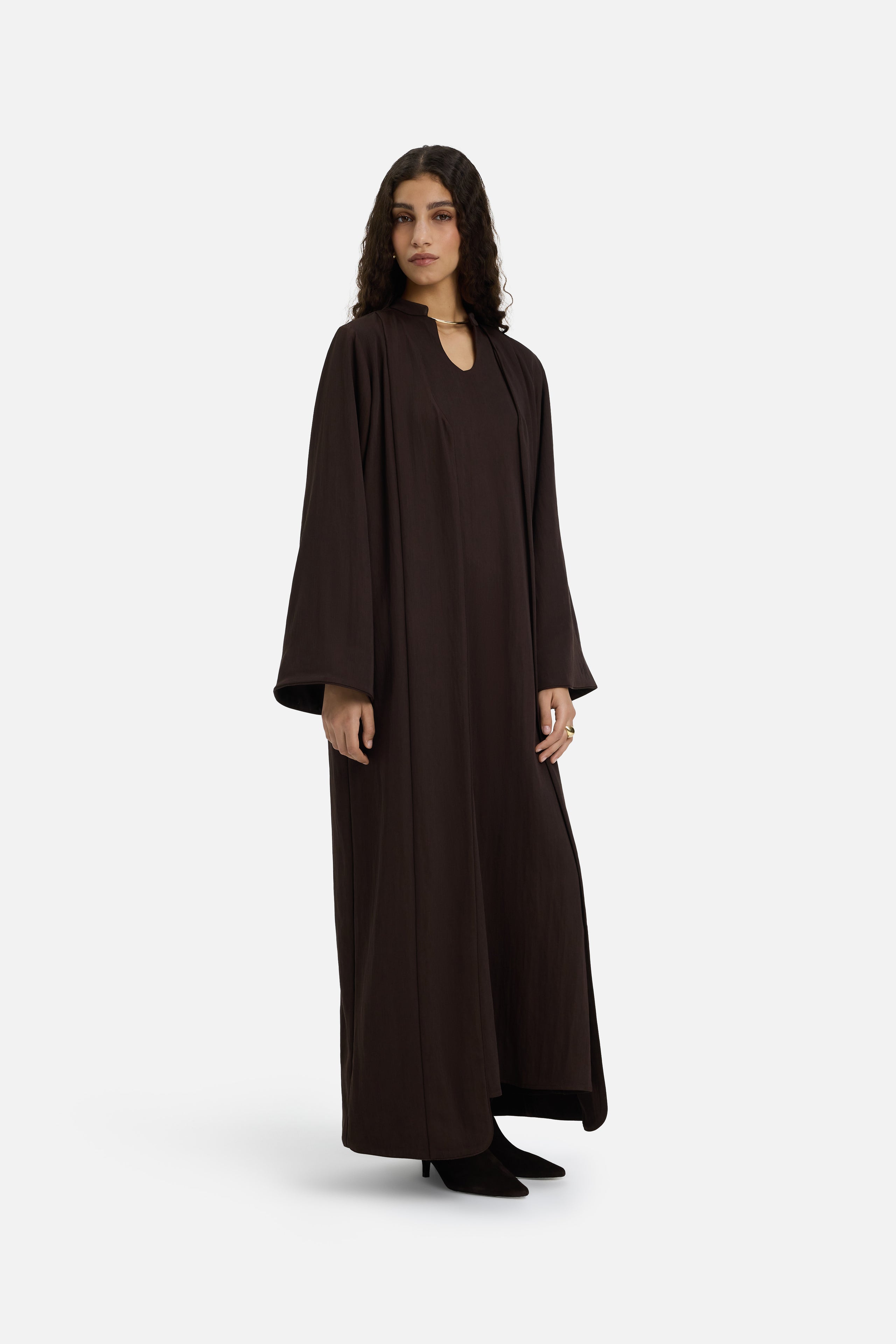 Front view model wearing dark brown abaya