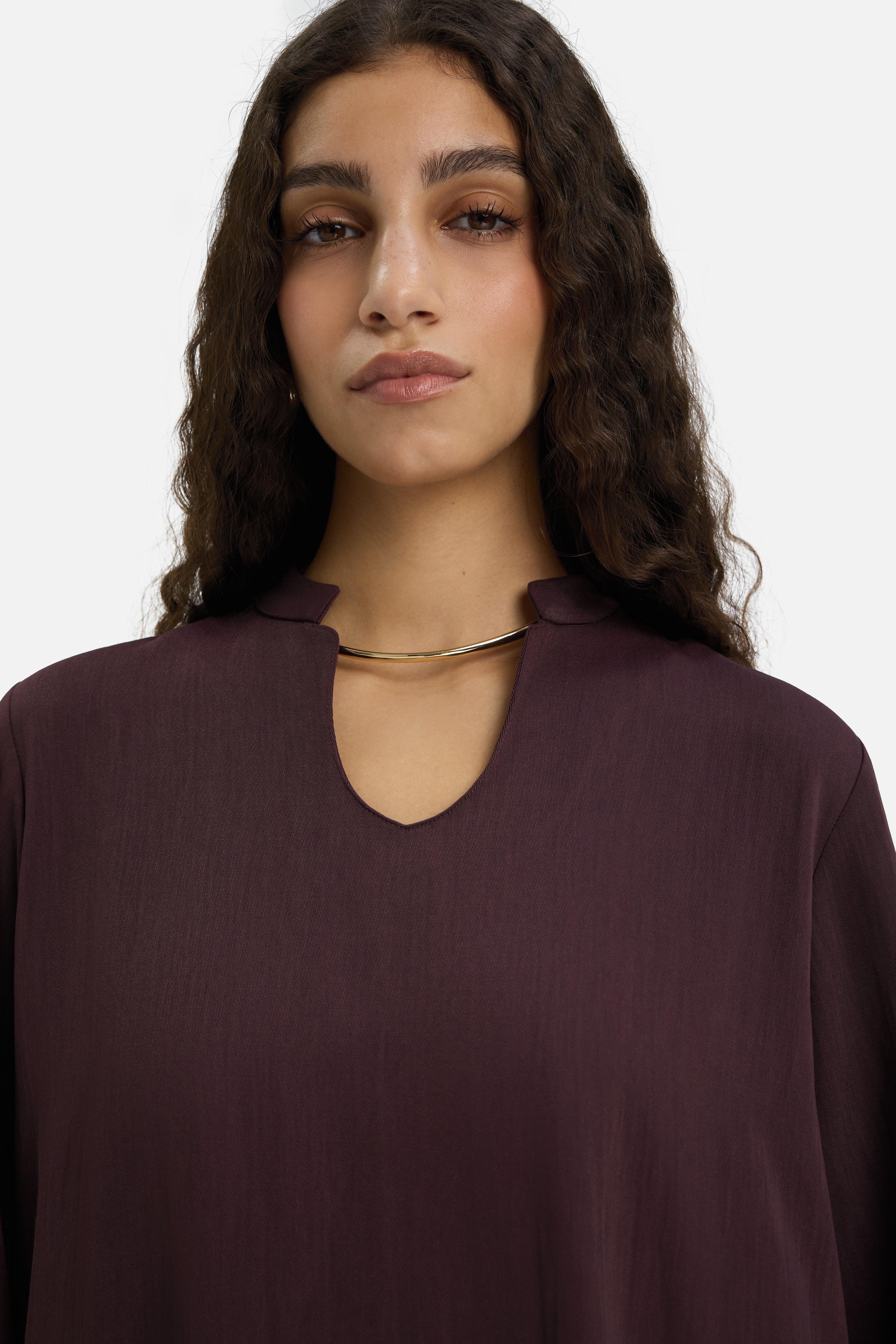 Close up model wearing purple dress