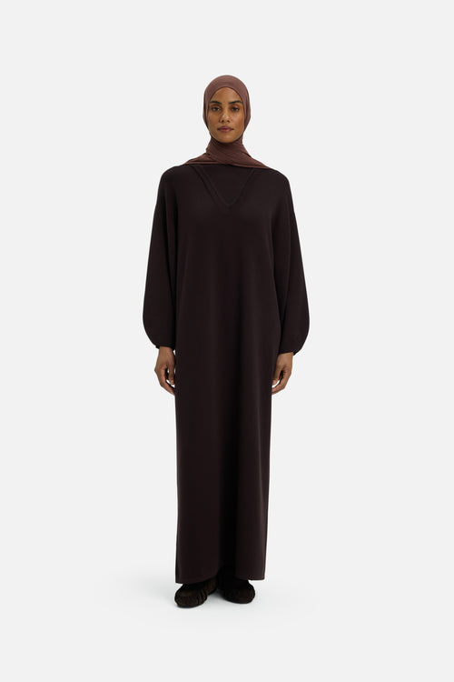 Front view model wearing long brown dress and headscarf