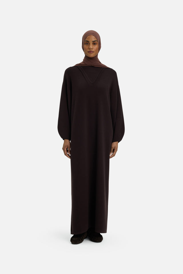 Front view model wearing long brown dress and headscarf